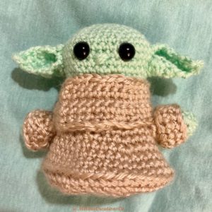 Front of crocheted Baby Yoda