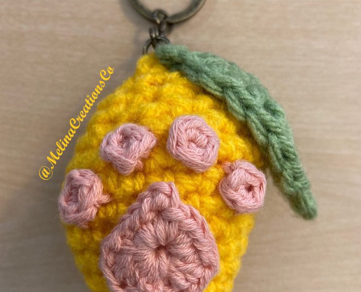 Custom crocheted mango keychain